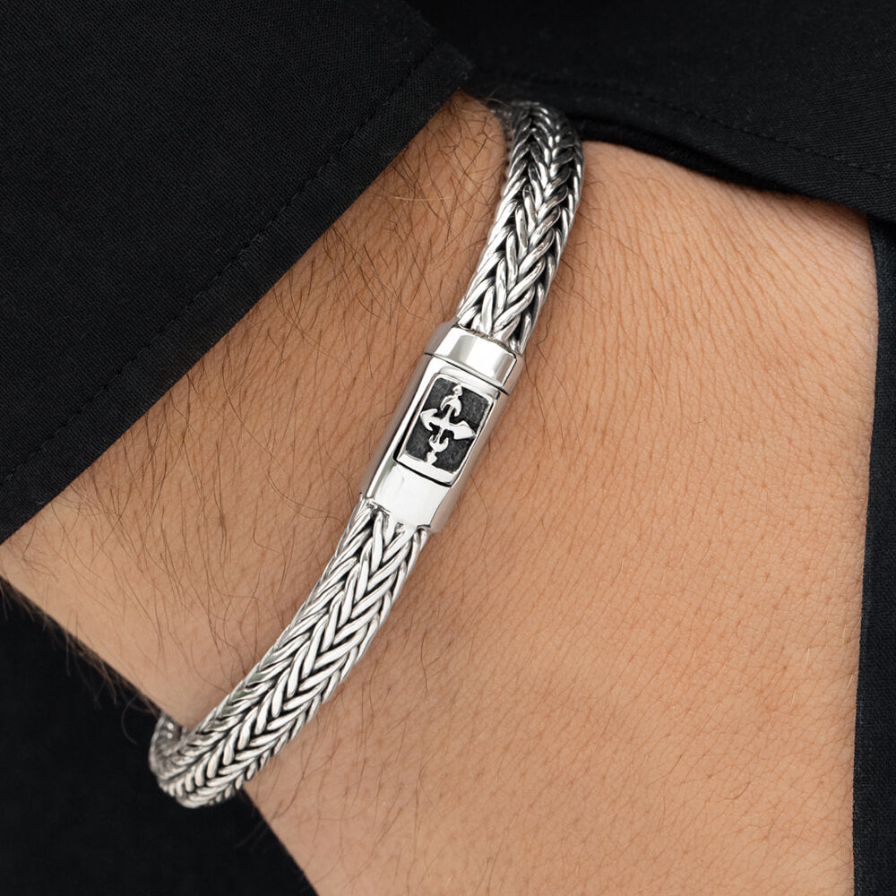 Silver bracelet with cross