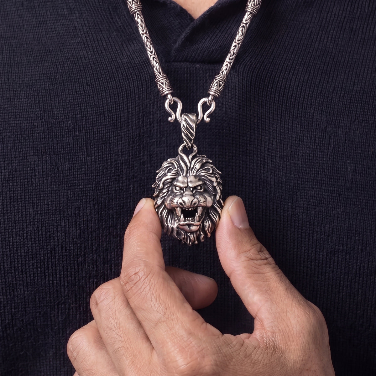 Silver lion pendant