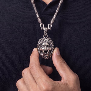 Silver lion pendant