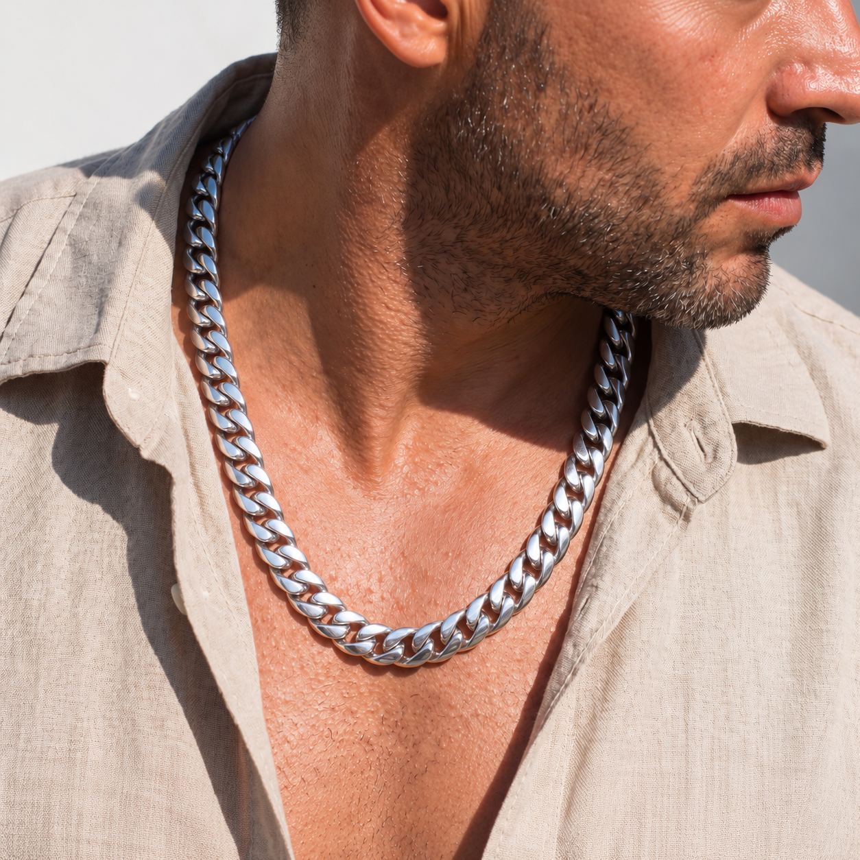 Sterling silver High Class Chain necklace worn with an open beige linen shirt